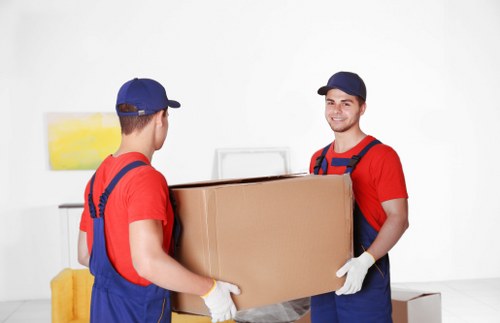 Removal van and moving boxes prepared for a local move in St Jamess