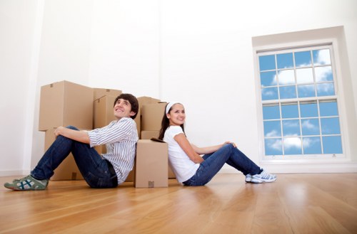 Loading furniture into a van for a St Jamess relocation