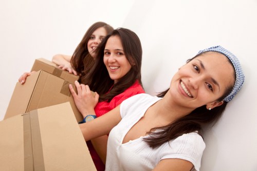 Local office movers handling desks and equipment in St Jamess