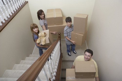 Loading furniture into a removal van in St Jamess